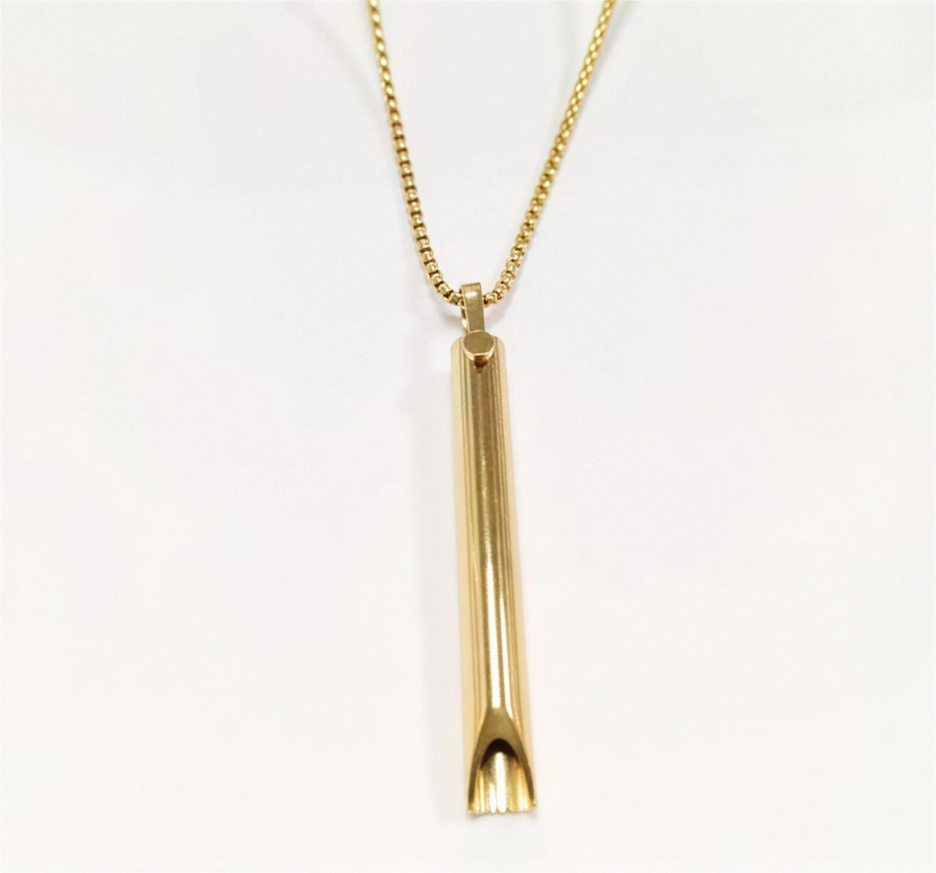 Slow-exhale breathing necklace in gold on a matching chain